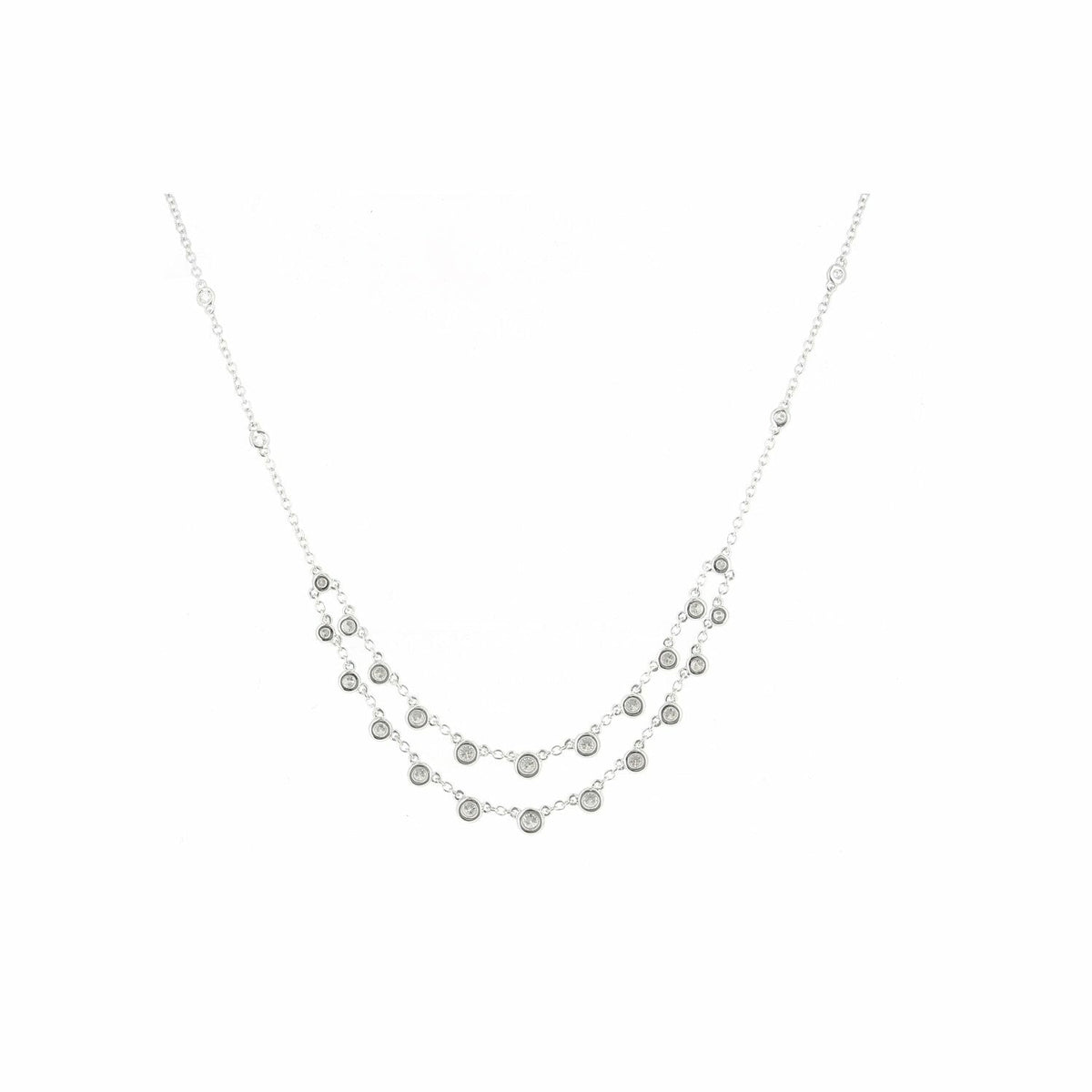 Collier double chaînes serti clos en or blanc et diamants
