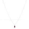 Pendentif en or blanc rubis