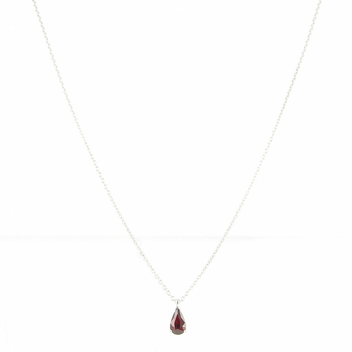 Pendentif en or blanc rubis