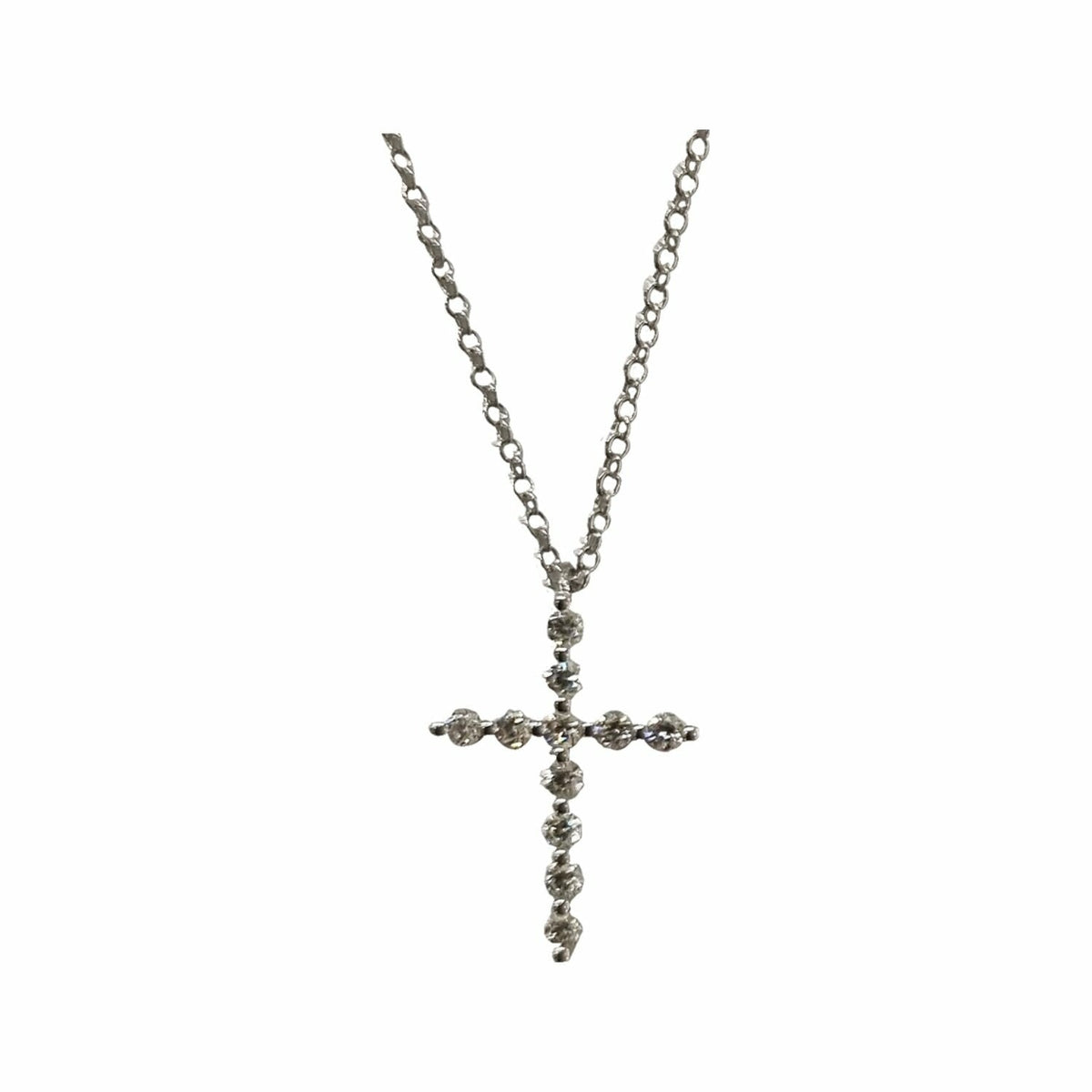 Collier croix en or gris et diamants