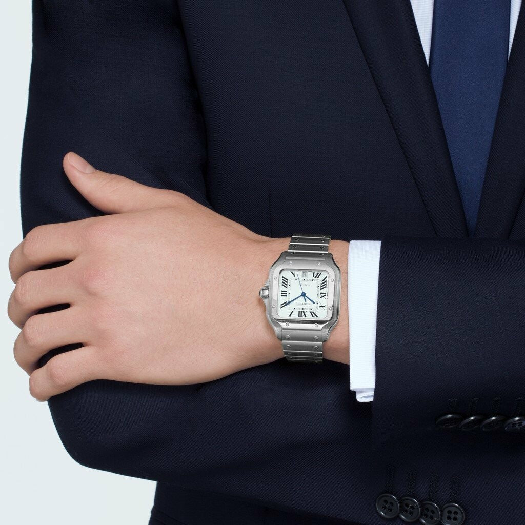 Montre Santos de Cartier Grand modèle, mouvement automatique, acier, bracelets métal et cuir interchangeables