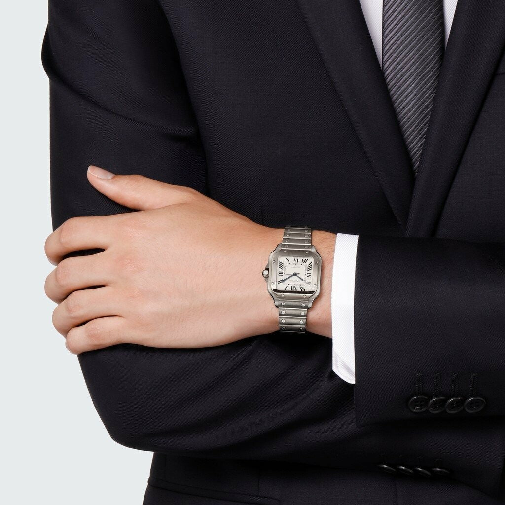 Montre Santos de Cartier Moyen modèle, mouvement automatique, acier, bracelets métal et cuir interchangeables
