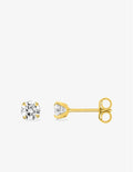 Boucles d'oreilles en or 18 ct et zirconiums 4mm 384-466