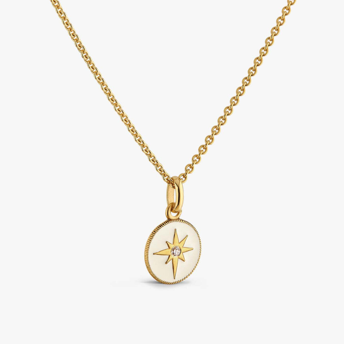 Médaille Arthus Bertrand Étoile en or jaune poli, laque ivoire  et diamant, 10mm