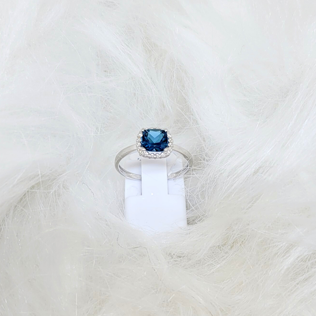 Bague en or blanc 18 ct et topaze london 307-101