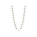 Collier Gigi Clozeau petit Kosmos en or jaune, résine noire et diamants, 42cm